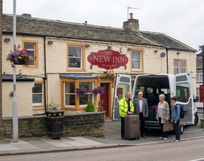 A&H Skipton Travel minibus with passengers in Wilsden