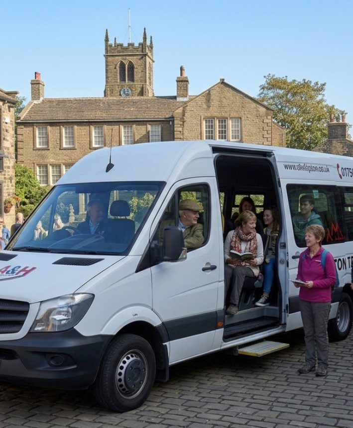 Passengers boarding a minibus for group travel in the Worth Valley